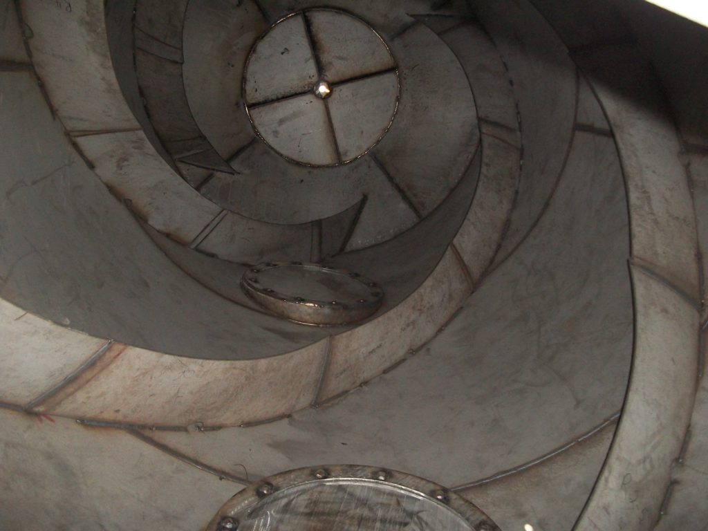 inside a mushroom compost mixer