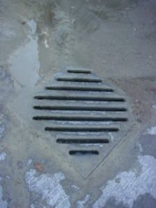 a drain at a cement truck wash